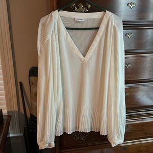 Calvin Klein. Size 2x.  Off white/blouse.  Never been worn.